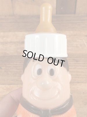 70年代頃のフリントストーンのフレッドのビンテージの哺乳瓶フィギュア