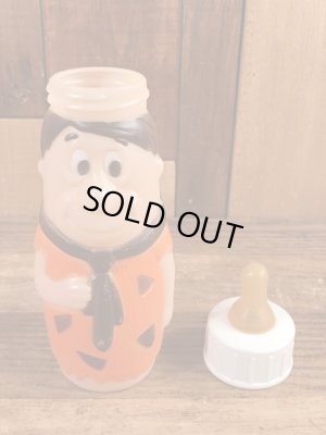 70年代頃のフリントストーンのフレッドのビンテージの哺乳瓶フィギュア