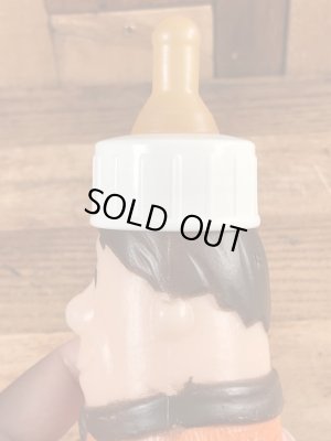 70年代頃のフリントストーンのフレッドのビンテージの哺乳瓶フィギュア