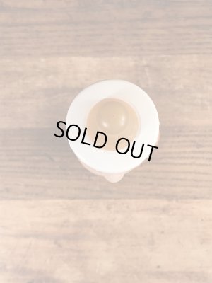 70年代頃のフリントストーンのフレッドのビンテージの哺乳瓶フィギュア