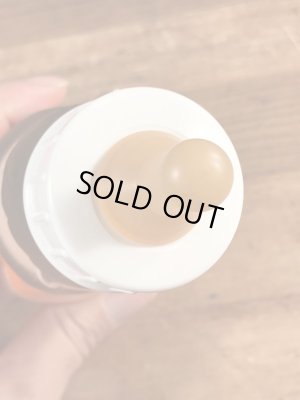 70年代頃のフリントストーンのフレッドのビンテージの哺乳瓶フィギュア