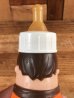 70年代頃のフリントストーンのフレッドのビンテージの哺乳瓶フィギュア