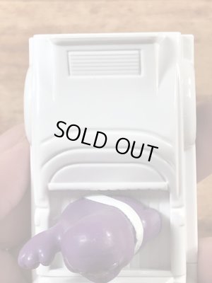 90年代のマクドナルドのグリマスのビンテージのハッピーミールトイ