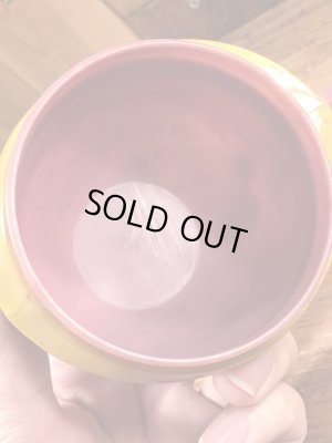 アドバタイジングキャラクターのファニーフェイスのビンテージのマグカップ