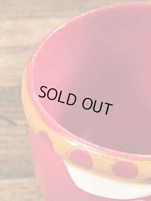 アドバタイジングキャラクターのファニーフェイスのビンテージのマグカップ