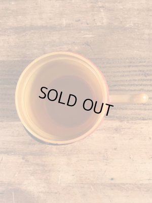 企業キャラクターのファニーフェイスのビンテージのマグカップ