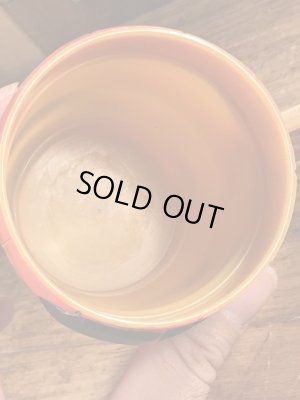 企業キャラクターのファニーフェイスのビンテージのマグカップ