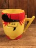 企業キャラクターのファニーフェイスのビンテージのマグカップ