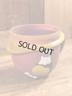 アドバタイジングキャラクターのファニーフェイスのビンテージのマグカップ