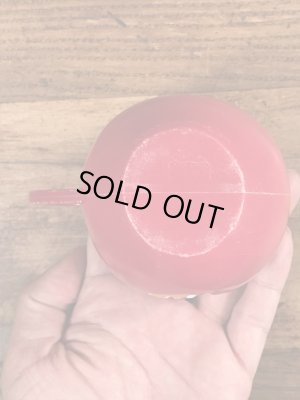 アドバタイジングキャラクターのファニーフェイスのビンテージのマグカップ