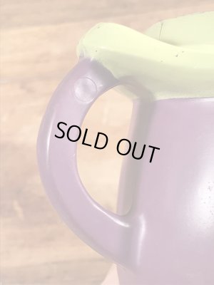 ファニーフェイスのグーフィーグレープのビンテージのマグカップ