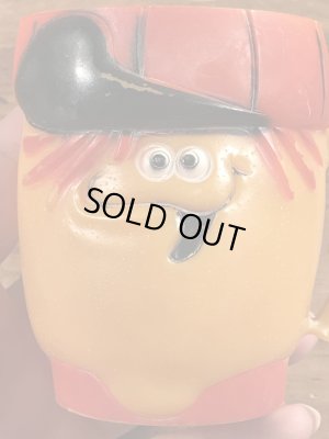 企業キャラクターのファニーフェイスのビンテージのマグカップ