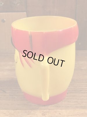 企業キャラクターのファニーフェイスのビンテージのマグカップ