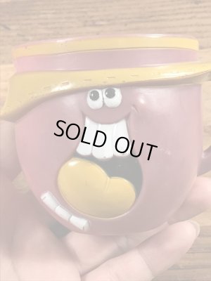 アドバタイジングキャラクターのファニーフェイスのビンテージのマグカップ