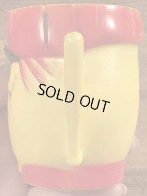 企業キャラクターのファニーフェイスのビンテージのマグカップ