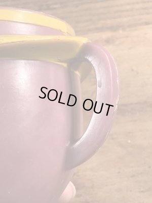 企業キャラクターのファニーフェイスのヴィンテージのおもちゃ