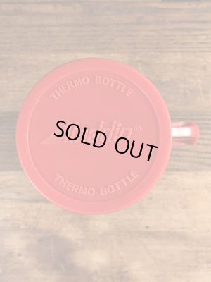 アドバタイジングキャラクターのミスタージップのビンテージの水筒