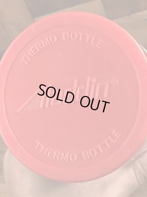 アドバタイジングキャラクターのミスタージップのビンテージの水筒