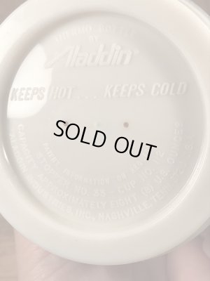 企業キャラクターのMr. Zipのヴィンテージのサーモボトル