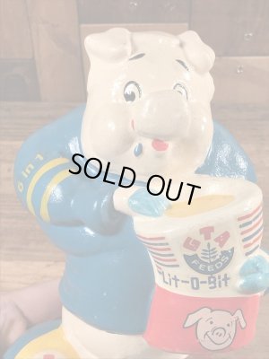 企業キャラクターのアーニーピッグのビンテージの貯金箱フィギュア