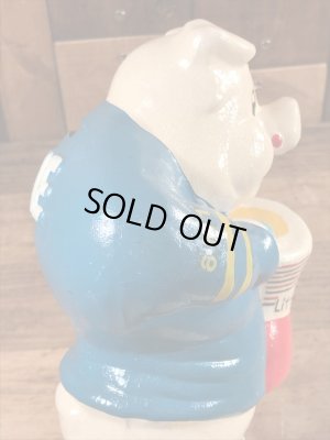 企業キャラクターのアーニーピッグのビンテージの貯金箱フィギュア