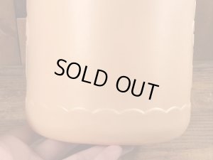 企業キャラクターのハッピージャックスのビンテージのクッキーコンテナー