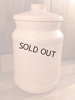 企業キャラクターのハッピージャックスのビンテージのクッキーコンテナー