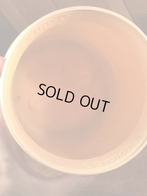 企業キャラクターのハッピージャックスのビンテージのクッキーコンテナー