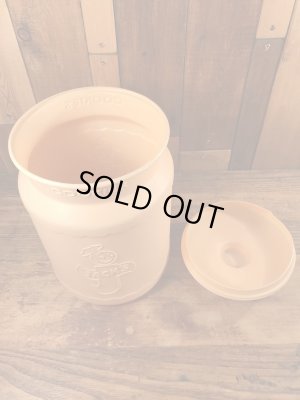 企業キャラクターのハッピージャックスのビンテージのクッキーコンテナー