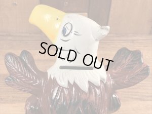 ブッシュガーデンのアドバタイジングキャラクターのビンテージのコインバンクドール