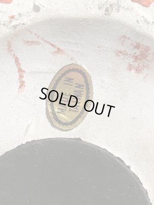 ブッシュガーデンのアドバタイジングキャラクターのビンテージのコインバンクドール