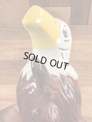 ブッシュガーデンのアドバタイジングキャラクターのビンテージのコインバンクドール