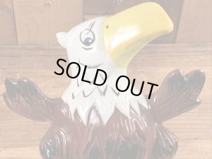 ブッシュガーデンのアドバタイジングキャラクターのビンテージのコインバンクドール