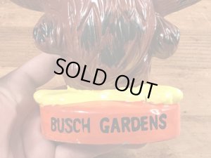 ブッシュガーデンの企業キャラクターのヴィンテージの貯金箱フィギュア