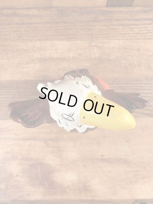 ブッシュガーデンのアドバタイジングキャラクターのビンテージのコインバンクドール