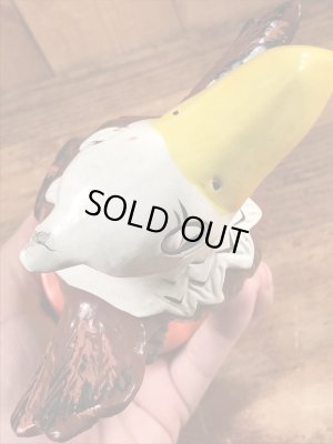 ブッシュガーデンのアドバタイジングキャラクターのビンテージのコインバンクドール