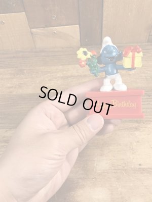 70’sのプレゼントを持ったスマーフのヴィンテージの台座付きPVC製フィギュア