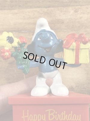 70年代頃のプレゼントを持ったスマーフのビンテージのPVCフィギュア