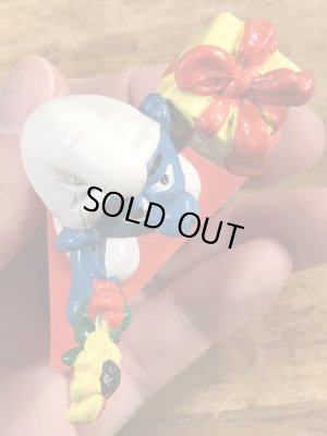 70年代頃のプレゼントを持ったスマーフのビンテージのPVCフィギュア