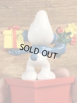 70年代頃のプレゼントを持ったスマーフのビンテージのPVCフィギュア