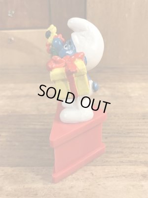 70’sのプレゼントを持ったスマーフのヴィンテージの台座付きPVC製フィギュア