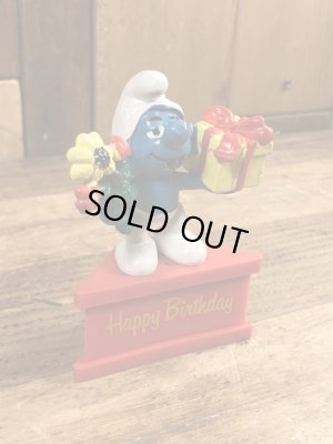 70年代頃のプレゼントを持ったスマーフのビンテージのPVCフィギュア