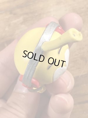 80年代頃の音楽を聴いているスノークスのビンテージのPVCフィギュア