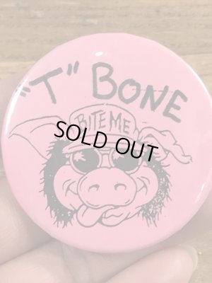 80年代頃のBite Meのブタが描かれたビンテージの缶バッジ