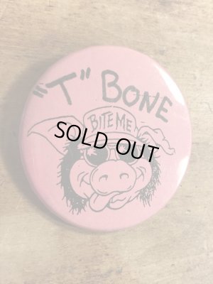 80年代頃のBite Meのブタが描かれたビンテージの缶バッジ