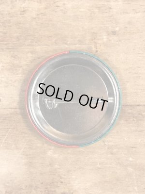 80’sのWhat's So Goddamned Terrific About...のメッセージが書かれたヴィンテージの缶バッチ