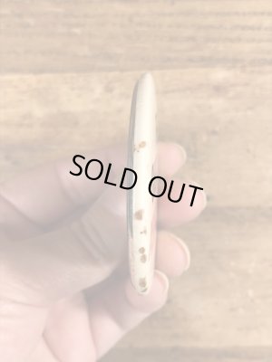 80年代頃のメッセージが書かれたビンテージの缶バッジ