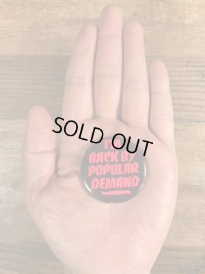 80年代頃のI'm Back By Popular Demandのメッセージが書かれたビンテージの缶バッジ