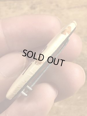 80年代頃のSit On A Happy Faceのメッセージが書かれたビンテージの缶バッジ