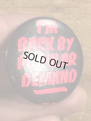 80年代頃のI'm Back By Popular Demandのメッセージが書かれたビンテージの缶バッジ
